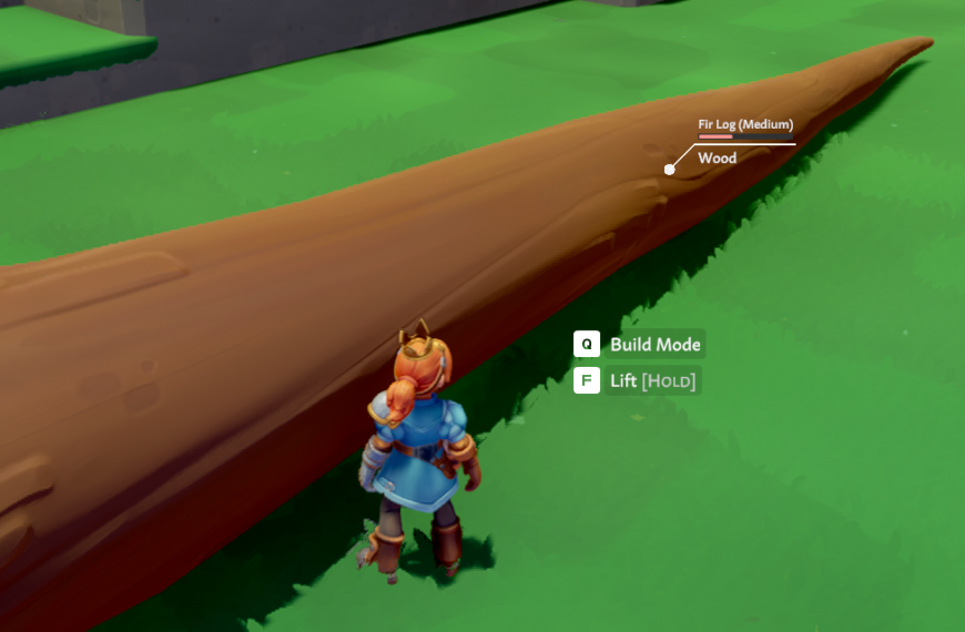 A character stands beside a large log in a green landscape, with on-screen prompts for "Build Mode" and "Lift."