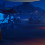 Nighttime scene in a desert setting featuring trailers, lights, and rocky mountains.