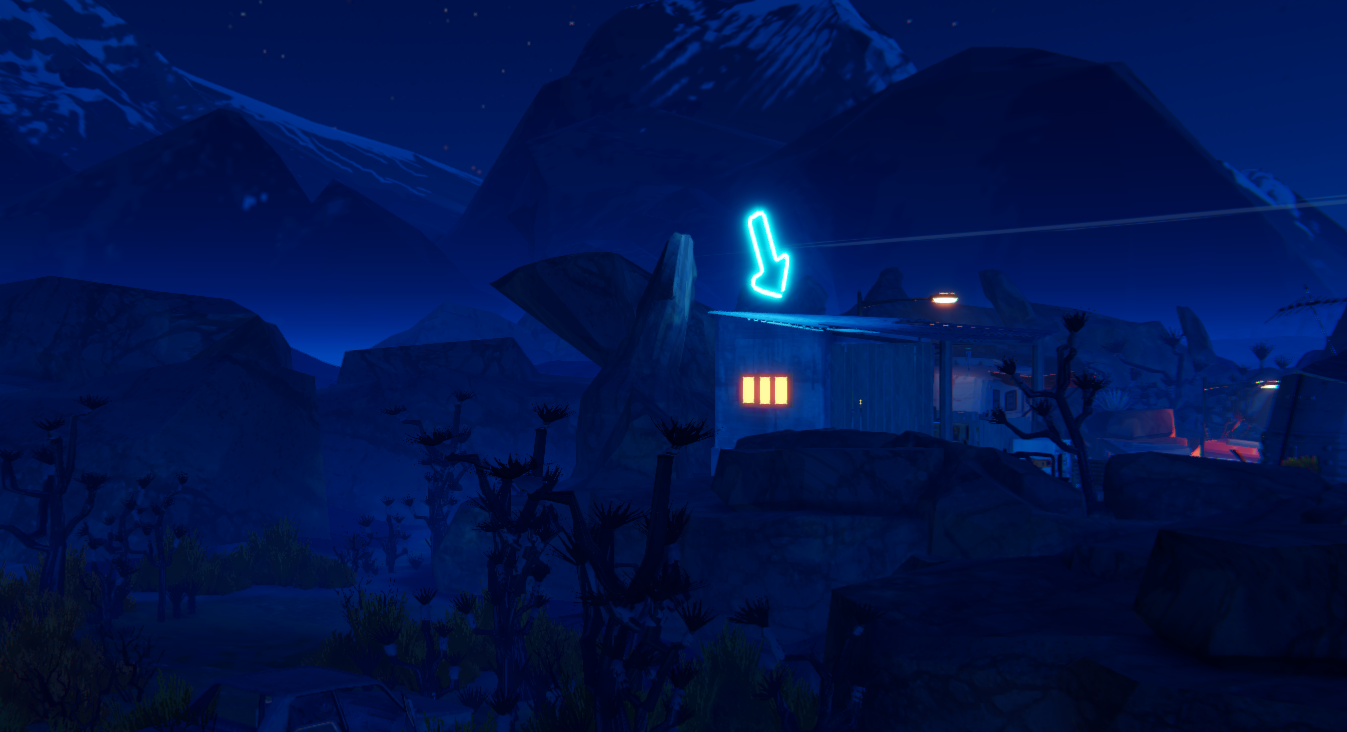 A nighttime scene featuring a small building with lit windows and a glowing arrow, surrounded by mountains and sparse vegetation.