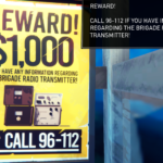 Reward poster offering $1,000 for information about the Brigade radio transmitter.