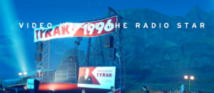 A stage set up for a political event in the video game Road 96, featuring a banner with "VIDEO KILLED THE RADIO STAR" and a depiction of President Tyrak.